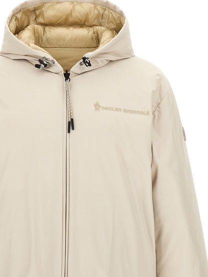 This Hooded Puffer Jacket by Moncler Grenoble for men in nylon beige exhibits a edgy silhouette, meticulously detailed with functional hooded, insulated & windproof and a edgy hooded neckline for a edgy finish.