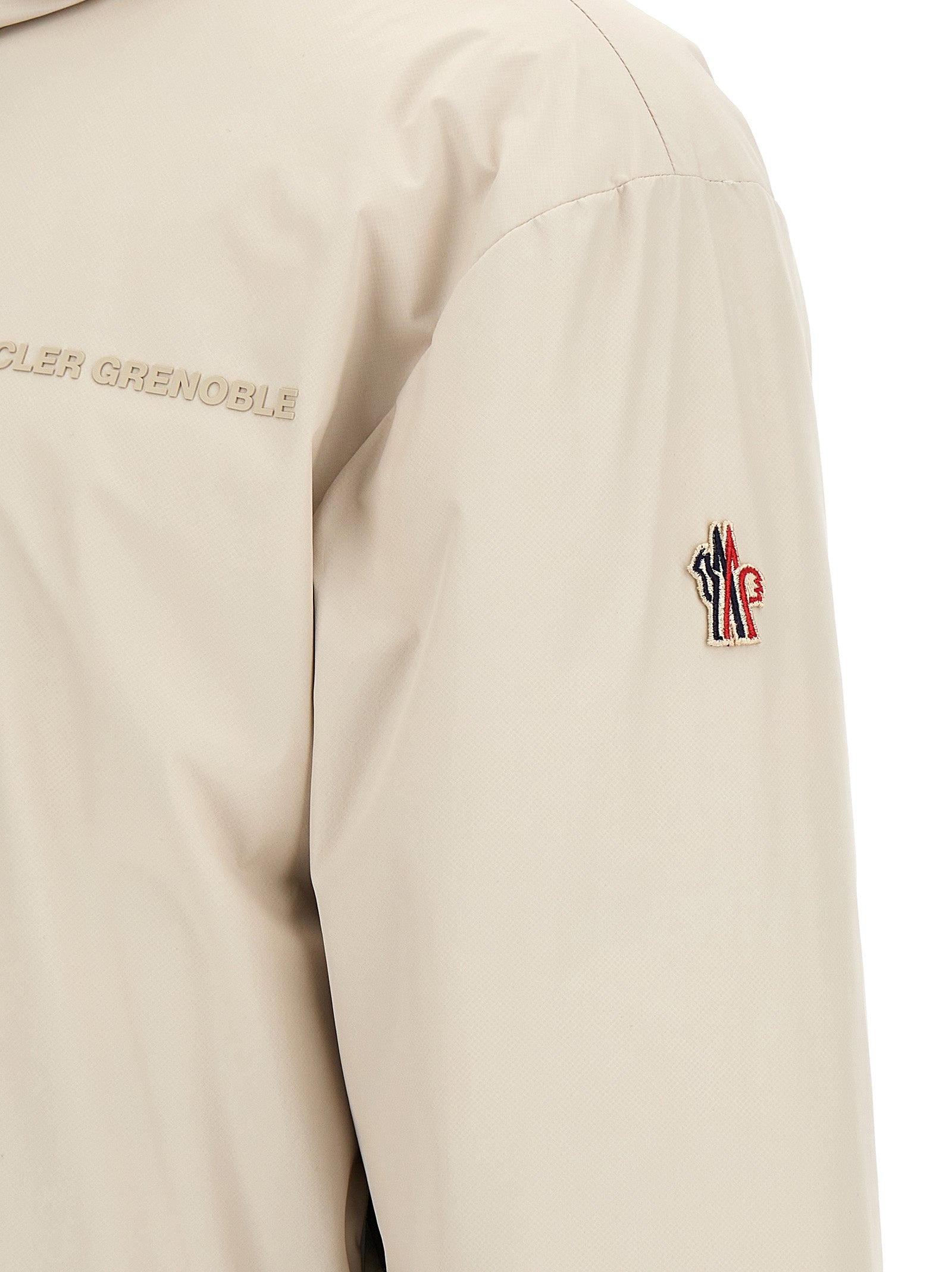 Hooded Puffer Jacket by Moncler Grenoble for men in nylon beige features an contemporary silhouette, showcasing a sophisticated and contemporary hooded, insulated & windproof for a truly refined look.
