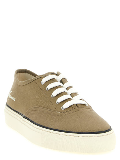 Sneakers by Jacquemus for men in cotton canvas bicolour & green features a chic design, perfectly showcasing the chic low-top style of this Men's Low Top Cotton Canvas Sneakers.