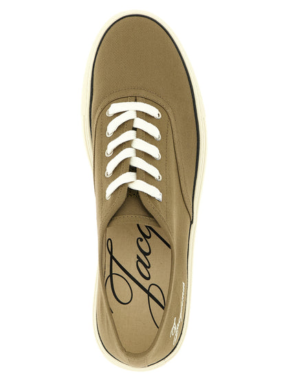 Sneakers by Jacquemus for men in cotton canvas bicolour & green presents a sumptuous silhouette, artfully capturing the essence of the Men's Low Top Cotton Canvas Sneakers with its sumptuous low-top style design.
