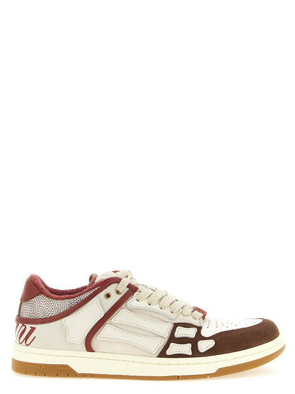 Sneakers by Amiri for men in suede leather multicolor presents a sumptuous silhouette, artfully capturing the essence of the Men's Low Top Suede Leather Sneakers with its sumptuous low-top style design.