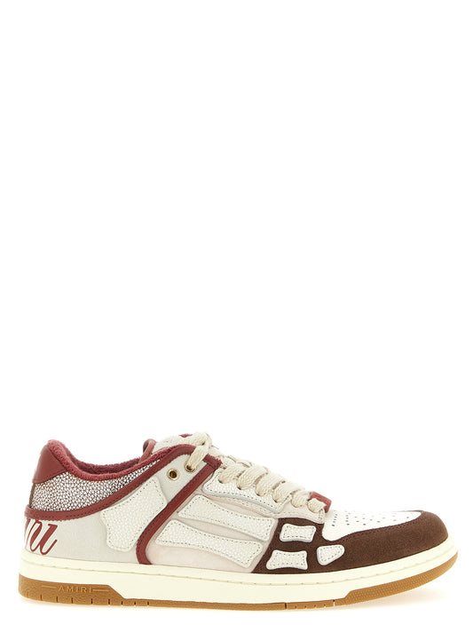 Sneakers by Amiri for men in suede leather multicolor presents a sumptuous silhouette, artfully capturing the essence of the Men's Low Top Suede Leather Sneakers with its sumptuous low-top style design.