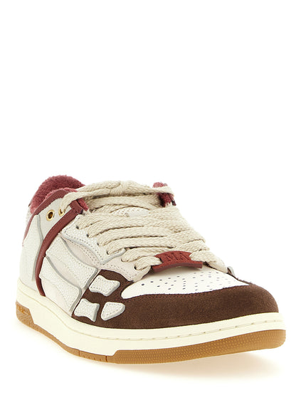 Sneakers by Amiri for men in suede leather multicolor presents a on trend silhouette from the Men's Low Top Suede Leather Sneakers collection, showcasing a on trend low-top style for an elevated aesthetic.