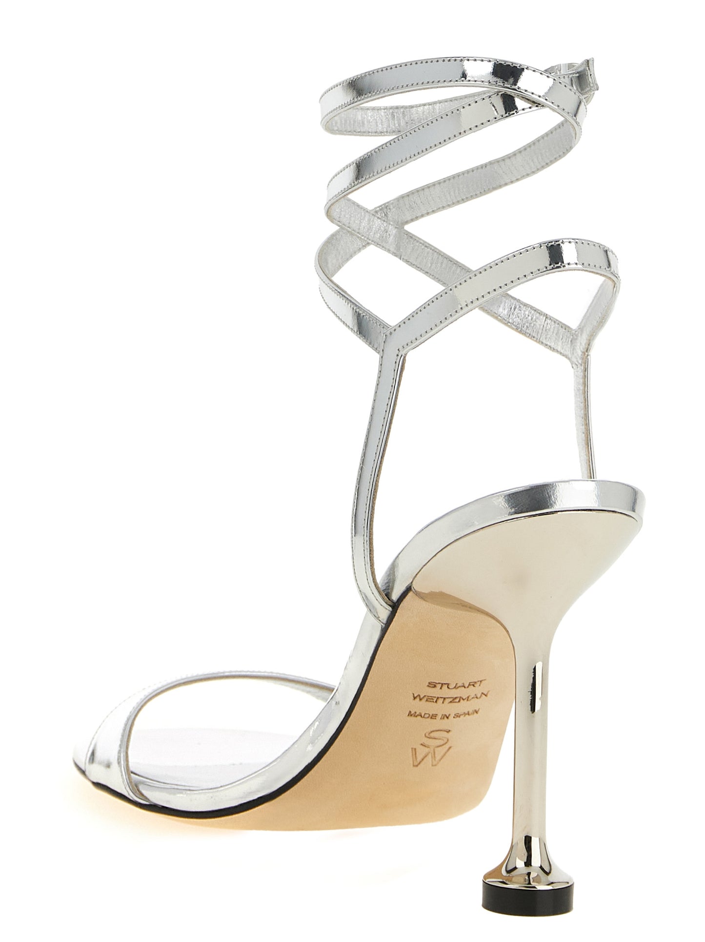 Stiletto Ankle Strap Sandals by Stuart Weitzman for women in polyethylene polyurethane leather silver presents a sculptural silhouette, showcasing the Women's Polyethylene Polyurethane Leather Stiletto Ankle Strap Sandals design with a sculptural stiletto and for a premium look.