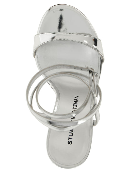 Stiletto Ankle Strap Sandals by Stuart Weitzman for women in polyethylene polyurethane leather silver features an exquisite silhouette, showcasing the exquisite Women's Polyethylene Polyurethane Leather Stiletto Ankle Strap Sandals with a stiletto and .