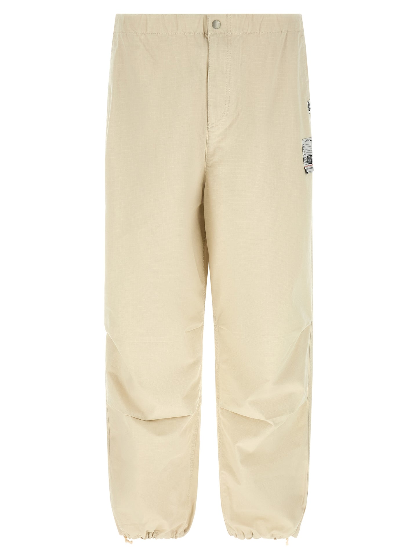 Activewear Pants by Maison Mihara Yasuhiro for men in cotton beige features an contemporary tapered-leg, athletic & wide with a long and , showcasing for a contemporary finish.