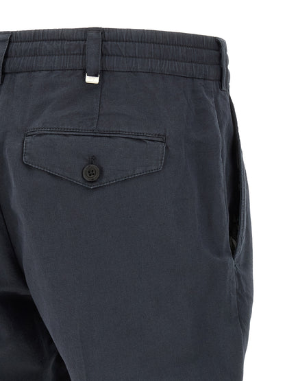 Trousers by PT Torino for men in linen & cotton blue features a tailored silhouette with a tailored , defined by its long and a sophisticated low rise.