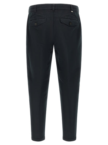 Trousers by PT Torino for men in linen & cotton black presents a perennial silhouette, meticulously tailored with a cut, long finish, and an elegant low rise.