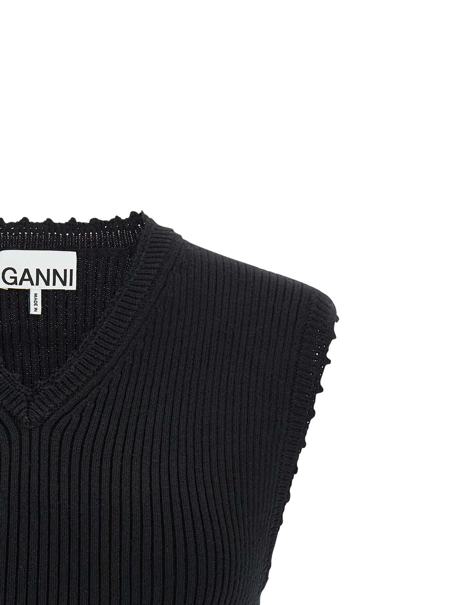 Vest by Ganni for women in organic cotton & polyamide black showcases a utilitarian silhouette, artfully incorporating and a utilitarian v-neck neckline for a truly utilitarian finish.