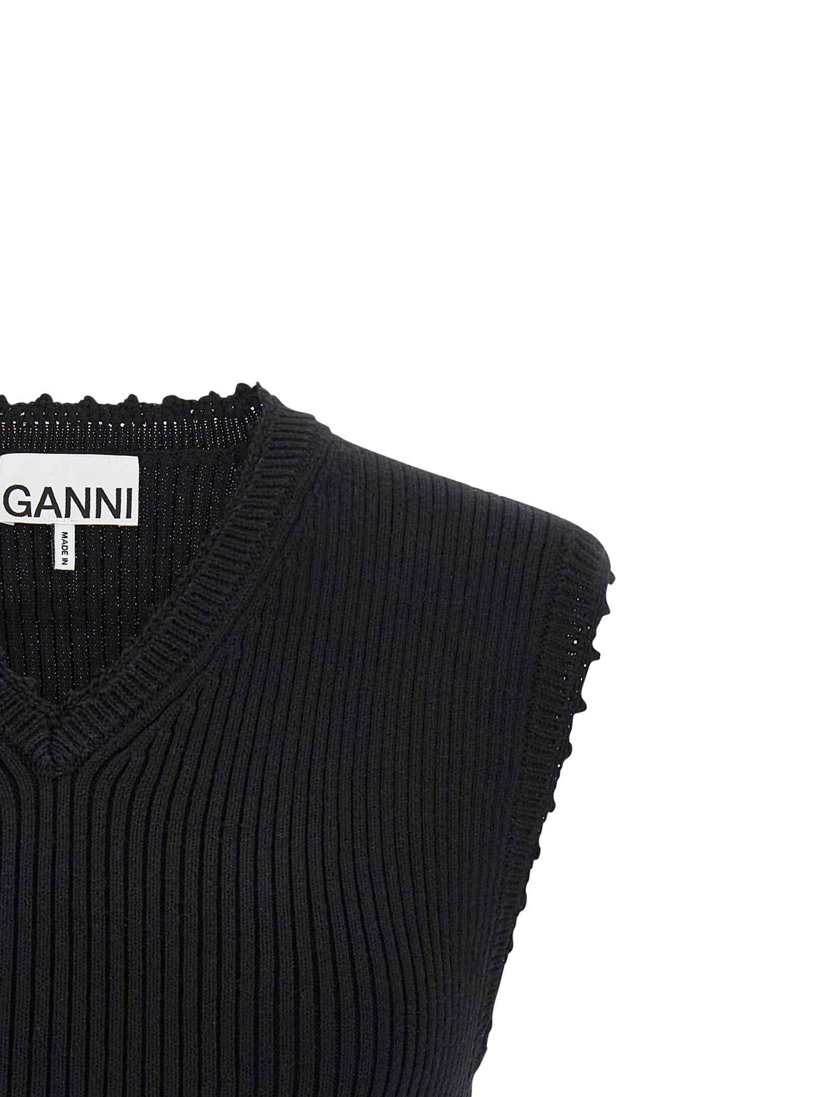 Vest by Ganni for women in organic cotton & polyamide black showcases a utilitarian silhouette, artfully incorporating and a utilitarian v-neck neckline for a truly utilitarian finish.