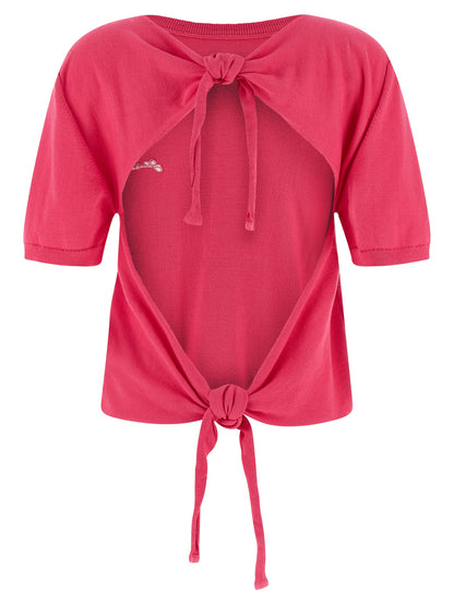 Cardigan by Ganni for women in organic cotton fuchsia showcases a captivating silhouette, artfully detailed with a captivating and round neckline for a truly sophisticated captivating look.