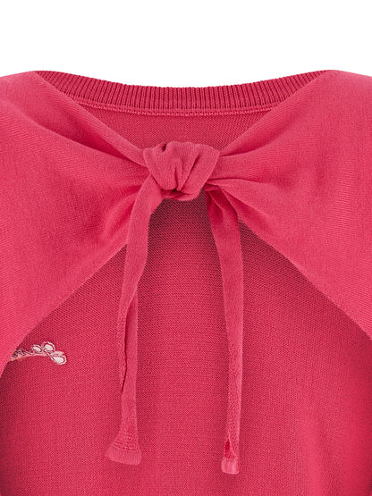Cardigan by Ganni for women in organic cotton fuchsia features an impeccable silhouette, showcasing a sophisticated and detail for a truly impeccable finish.