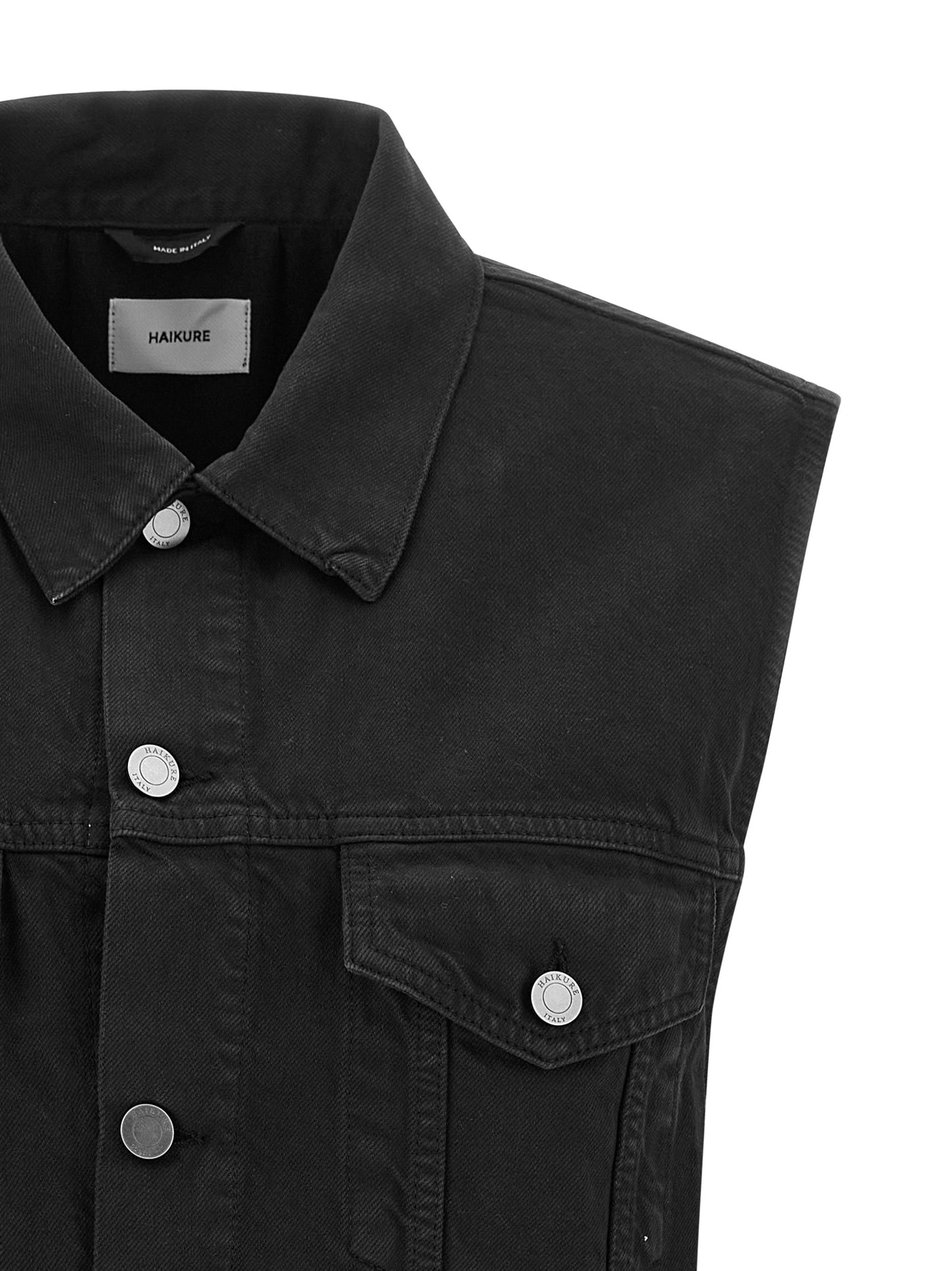 Vest by Haikure for women in satin denim cotton & leather black features a enviable silhouette, elegantly detailed with a enviable shirt-collar neckline and functional pockets for a enviable finish.