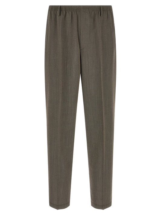 Trousers by CELLAR DOOR for men in virgin wool brown features a tailored silhouette with a tailored tapered-leg & wide, defined by its long and a sophisticated .