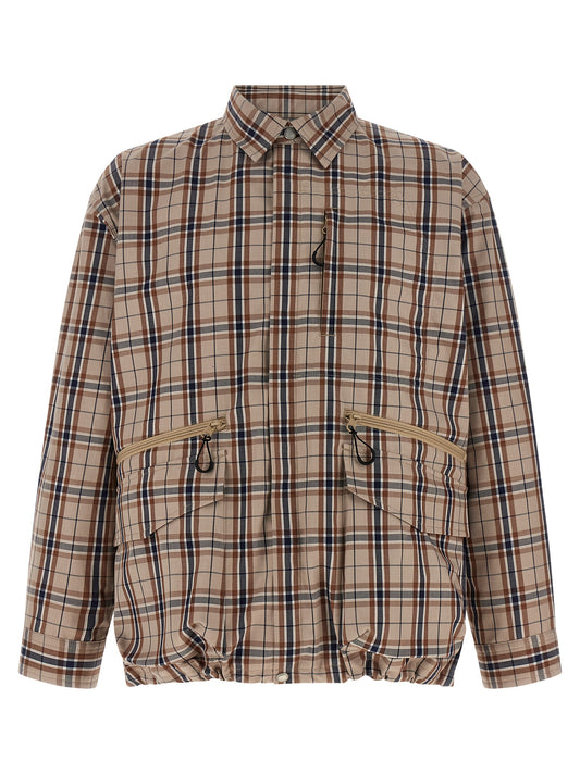Overcoat by Comme Des Garçons for men in cotton nylon & polyester beige & print presents a luxurious silhouette, showcasing a luxurious shirt-collar neckline and sophisticated pockets for a premium, luxurious look.