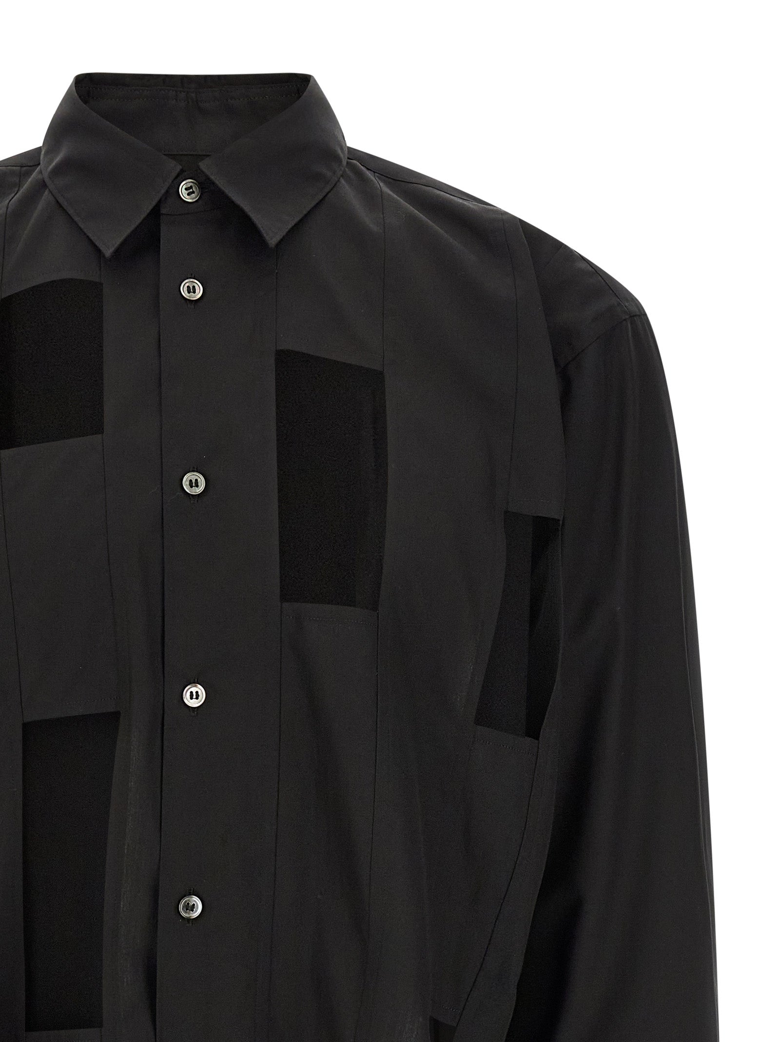 Shirt by Comme Des Garçons for men in cotton black & pearl showcases a sublime silhouette, artfully detailed with a sublime and for a sophisticated, sublime finish.