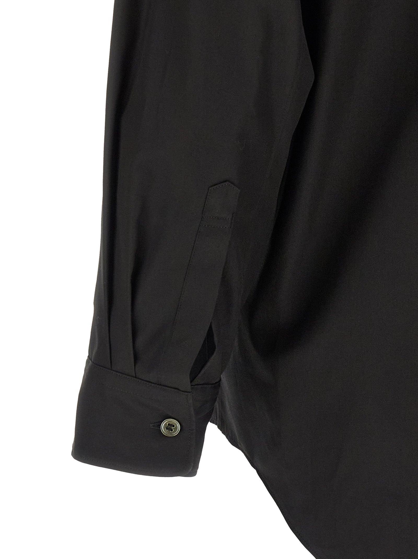 Shirt by Comme Des Garçons for men in cotton black & pearl showcases a sharp silhouette, elegantly detailed with a sharp and sharp .