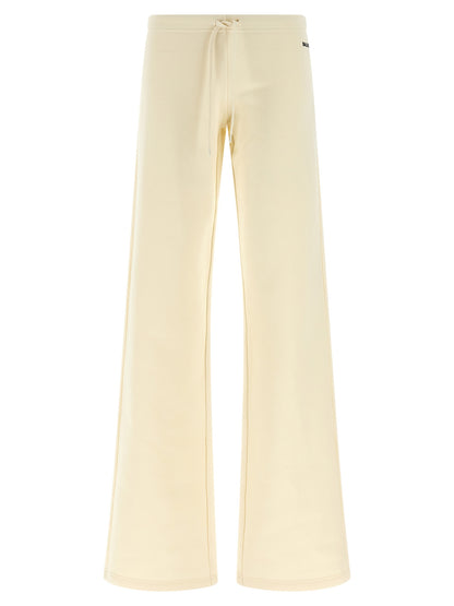 Joggers by Balenciaga for women in cotton white features an sartorial flared & wide and long with a low rise cut for a sartorial finish.