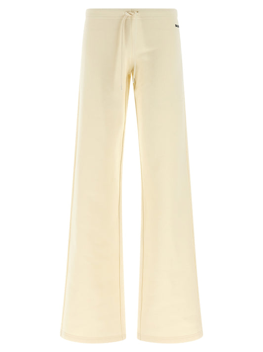 Joggers by Balenciaga for women in cotton white features an sartorial flared & wide and long with a low rise cut for a sartorial finish.