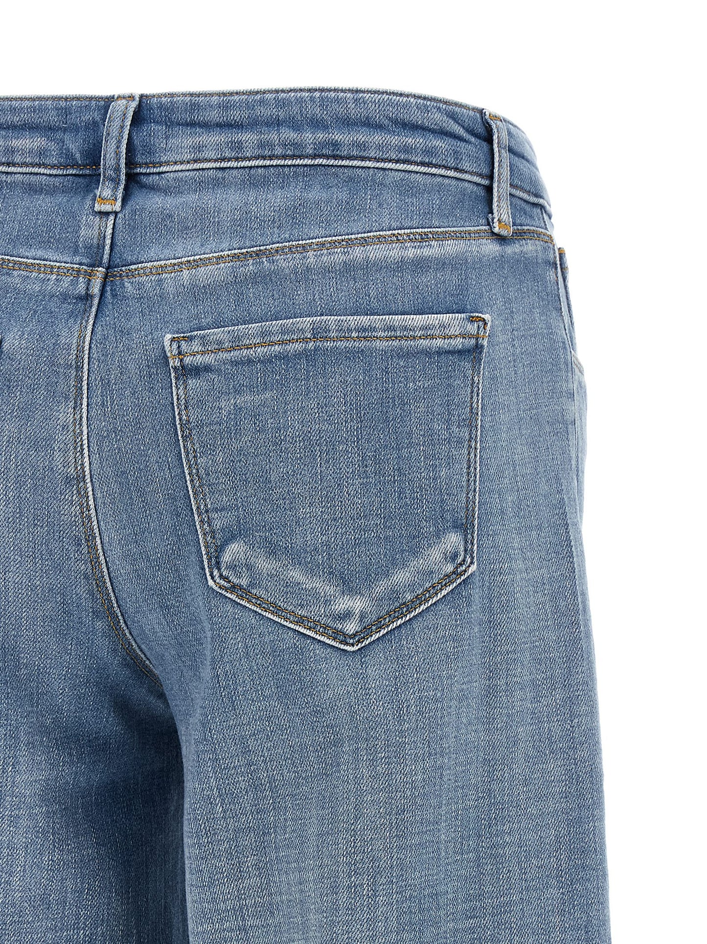 Jeans by L'Agence for women in stretch denim cotton polyester light-blue presents a tailored silhouette, showcasing a tailored straight-leg & wide and long cut with a refined low rise for a truly tailored aesthetic.