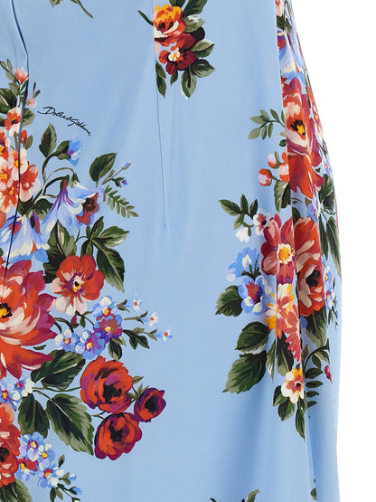 Dress by Dolce & Gabbana for women in silk light-blue, floral & print presents a sinuous silhouette, showcasing a sophisticated and detailed with a sinuous midi for a refined finish.