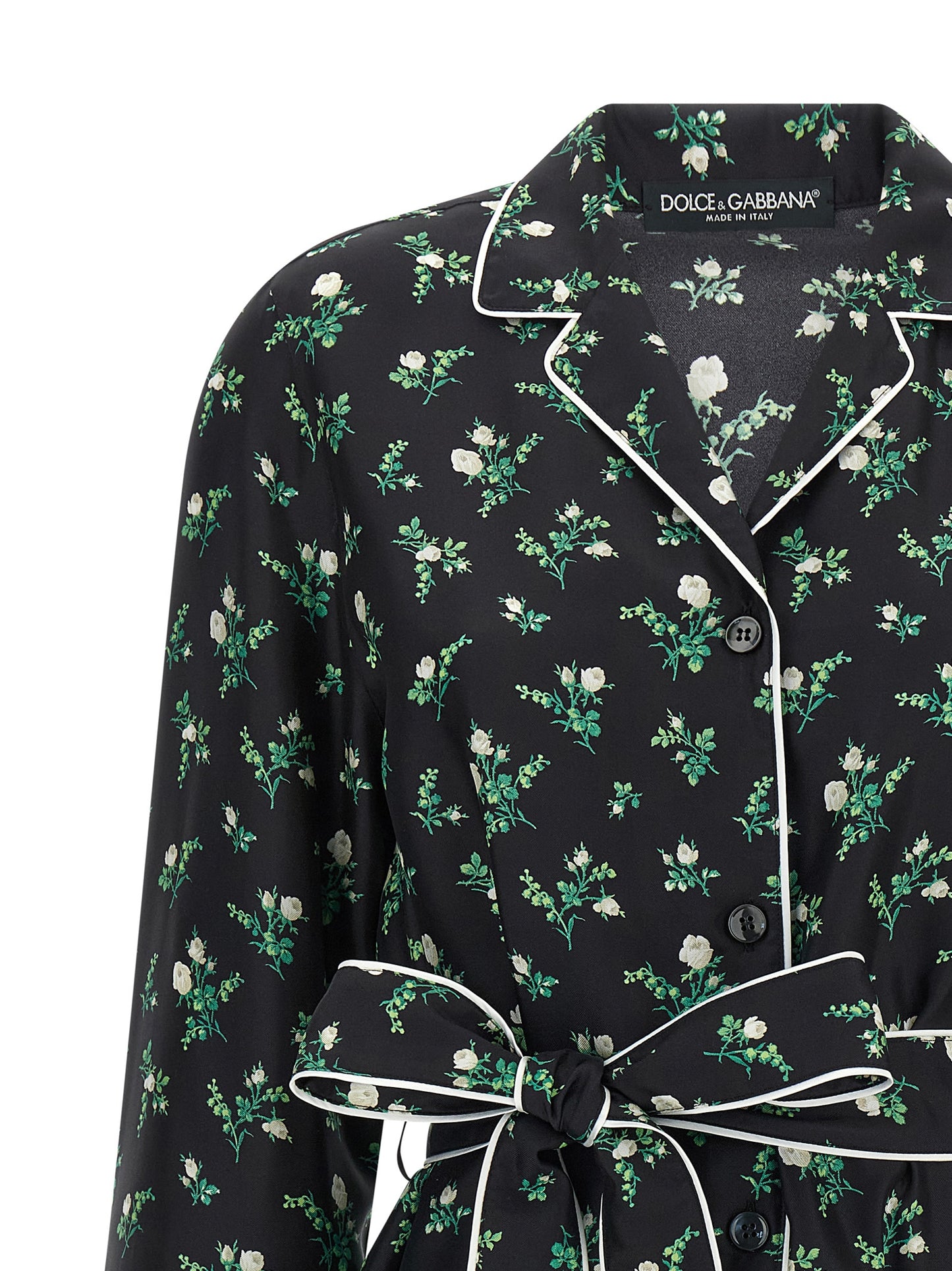 Blouse by Dolce & Gabbana for women in silk twill black, floral & print features an architectural silhouette with a refined and elegant lapel neckline for a architectural look.
