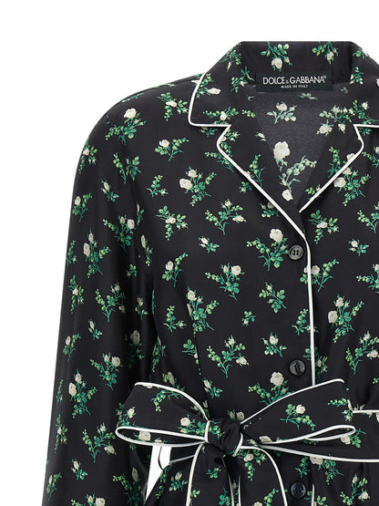 Blouse by Dolce & Gabbana for women in silk twill black, floral & print features an architectural silhouette with a refined and elegant lapel neckline for a architectural look.