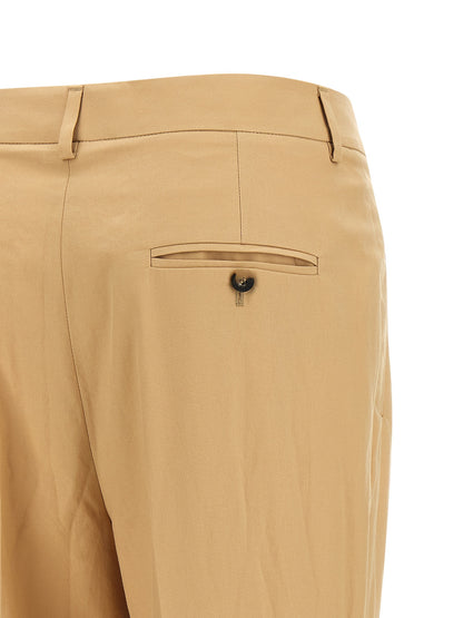 Trousers by Alberto Biani for women in cotton canvas beige presents a perennial silhouette, meticulously tailored with a straight-leg cut, long finish, and an elegant .