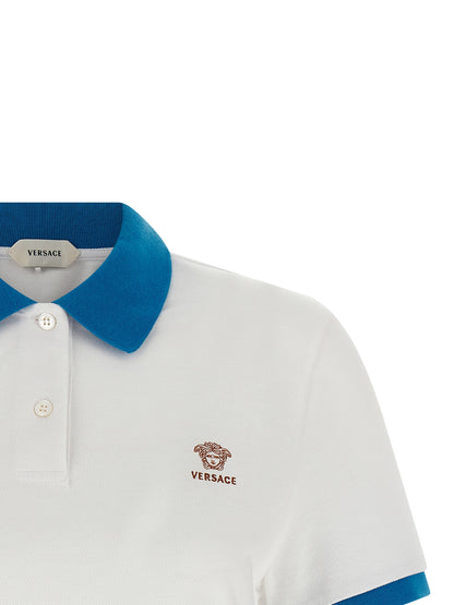 Polo Shirt by Versace for women in cotton blue presents a crisp silhouette, artfully detailed with a crisp and crisp .