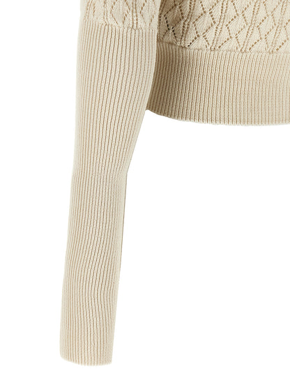 Cardigan by Vivienne Westwood for women in organic cotton beige & patterned showcases a captivating silhouette, artfully detailed with a captivating and for a truly sophisticated captivating look.