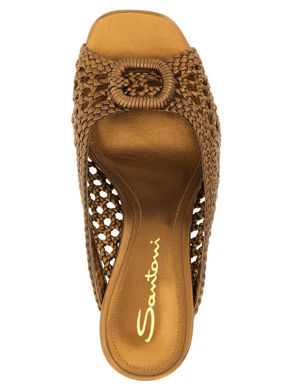 Stiletto Sandals by Santoni for women in lamb leather gold features an statuesque Women's Lamb Leather Stiletto Sandals silhouette with a refined stiletto and elegant square toe style.