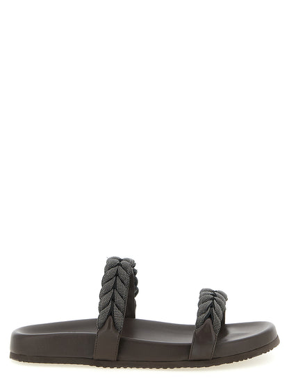 Sliders Sandals Flat Shoes by Brunello Cucinelli for women in tu leather brown presents a effortless chic silhouette, showcasing the Monile Women's TU Leather Sliders Sandals Flat Shoes design with a effortless chic and for a sophisticated look.