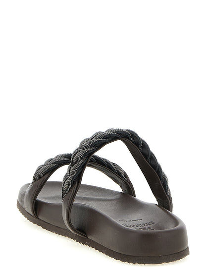 Sliders Sandals Flat Shoes by Brunello Cucinelli for women in tu leather brown features an statuesque silhouette from the Monile Women's TU Leather Sliders Sandals Flat Shoes collection, showcasing a and a statuesque for a statuesque look.