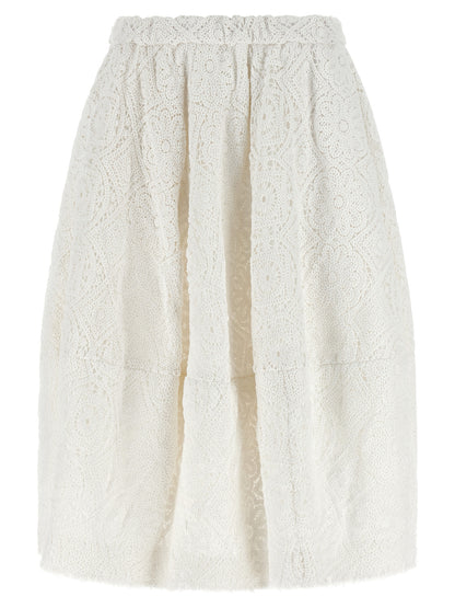 Skirt by Comme Des Garçons for women in cotton white showcases a dramatic silhouette, artfully capturing the essence of the Women's Flared Cotton Skirt in a dramatic midi cut for a refined look.