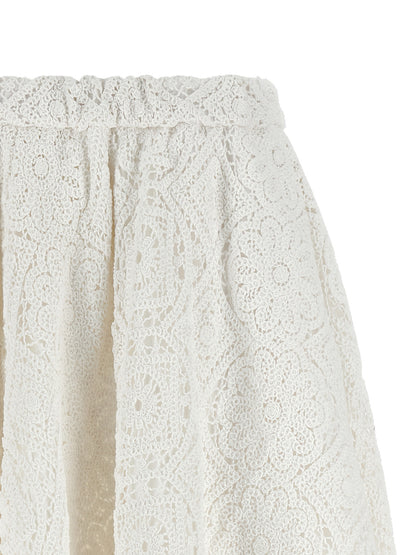 Skirt by Comme Des Garçons for women in cotton white features a contoured silhouette from the Women's Flared Cotton Skirt collection, characterized by its contoured midi for a contoured finish.