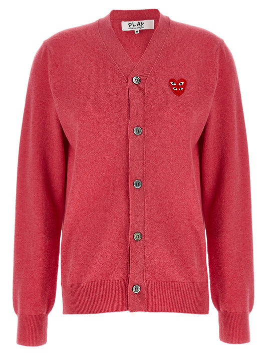 Cardigan by Comme Des Garçons Play for women in wool multicolor, pink & red features an impeccable silhouette, showcasing a sophisticated v-neck neckline and long-sleeve detail for a truly impeccable finish.