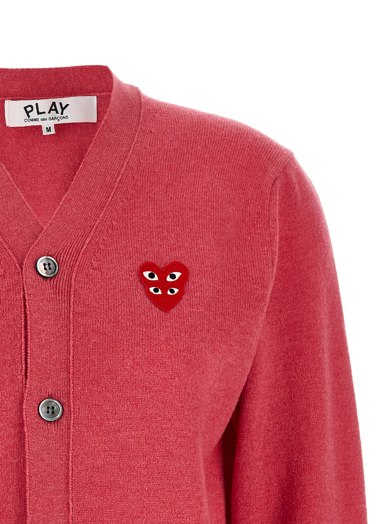 Cardigan by Comme Des Garçons Play for women in wool multicolor, pink & red presents a textural silhouette, artfully finished with a textural v-neck neckline and for a sophisticated, textural look.