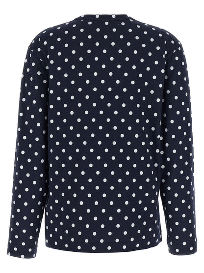 T-Shirt by Comme Des Garçons Play for women in cotton blue, red & print showcases a unassuming silhouette, artfully detailed with a refined crew neckline and unassuming for a sophisticated, contemporary look.