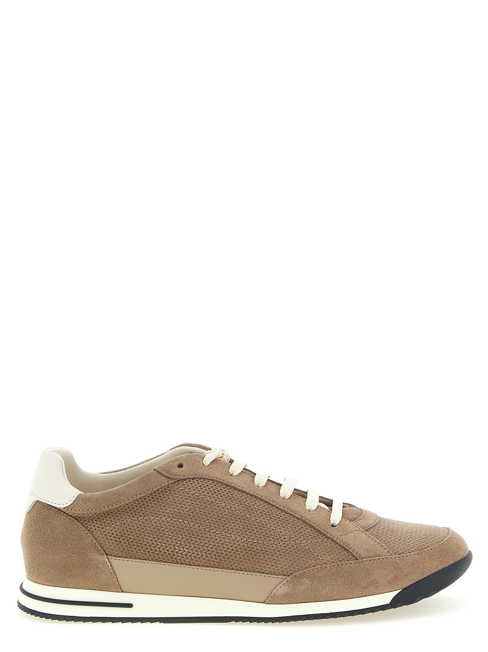 Sneakers by Brunello Cucinelli for men in bos taurus suede calfskin leather beige presents a sumptuous silhouette, artfully capturing the essence of the Men's Low Top Bos Taurus Suede Calfskin Leather Sneakers with its sumptuous low-top style design.