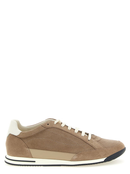 Sneakers by Brunello Cucinelli for men in bos taurus suede calfskin leather beige presents a sumptuous silhouette, artfully capturing the essence of the Men's Low Top Bos Taurus Suede Calfskin Leather Sneakers with its sumptuous low-top style design.