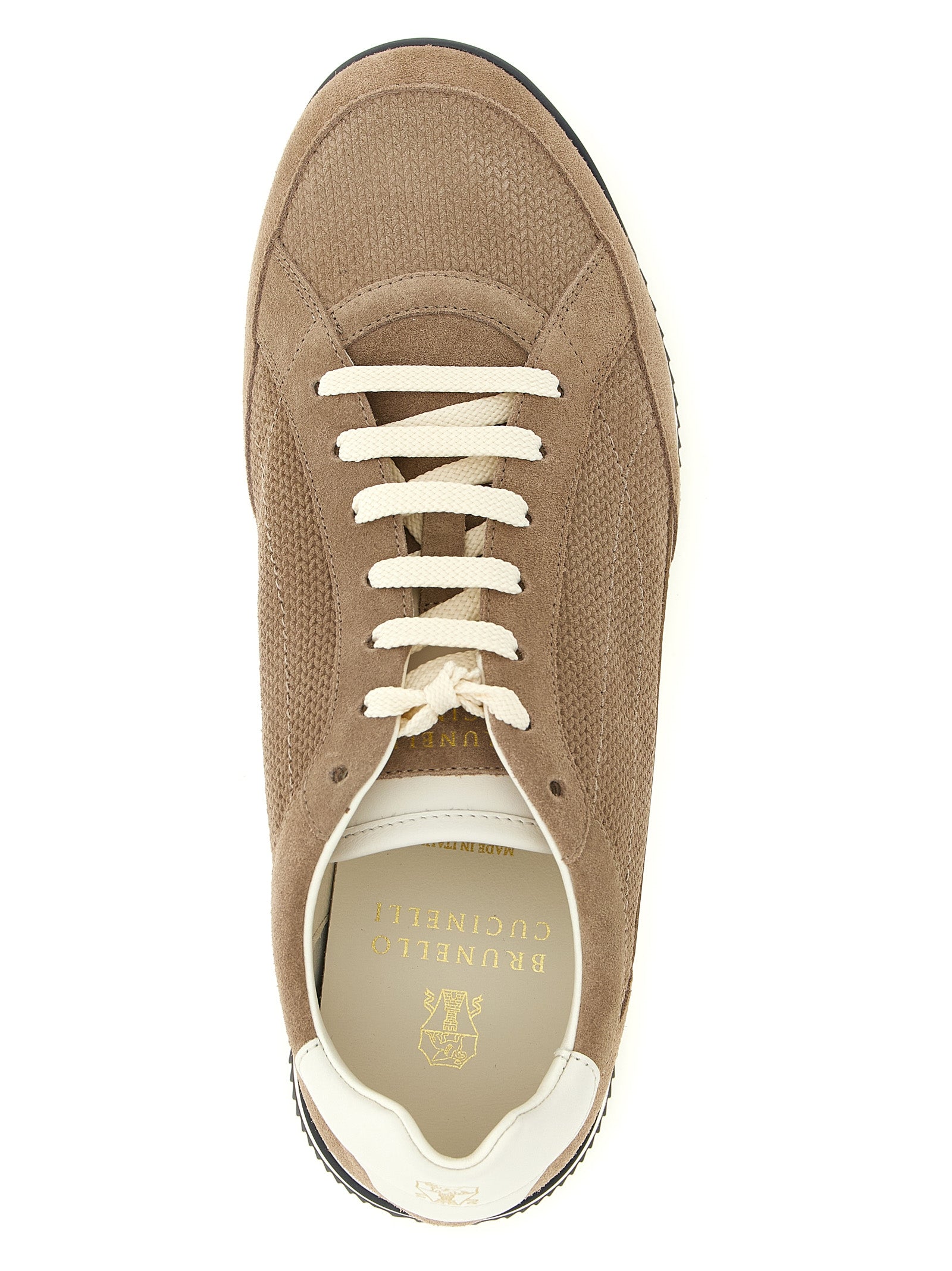 Sneakers by Brunello Cucinelli for men in bos taurus suede calfskin leather beige presents a sumptuous silhouette, artfully capturing the essence of the Men's Low Top Bos Taurus Suede Calfskin Leather Sneakers with its sumptuous low-top style design.