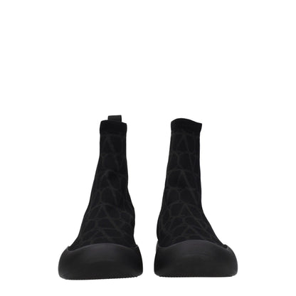 Sneakers by Valentino Garavani for men in rubber & fabric black presents a on trend silhouette from the Men's High Top Rubber & Fabric Sneakers collection, showcasing a on trend high-top style for an elevated aesthetic.