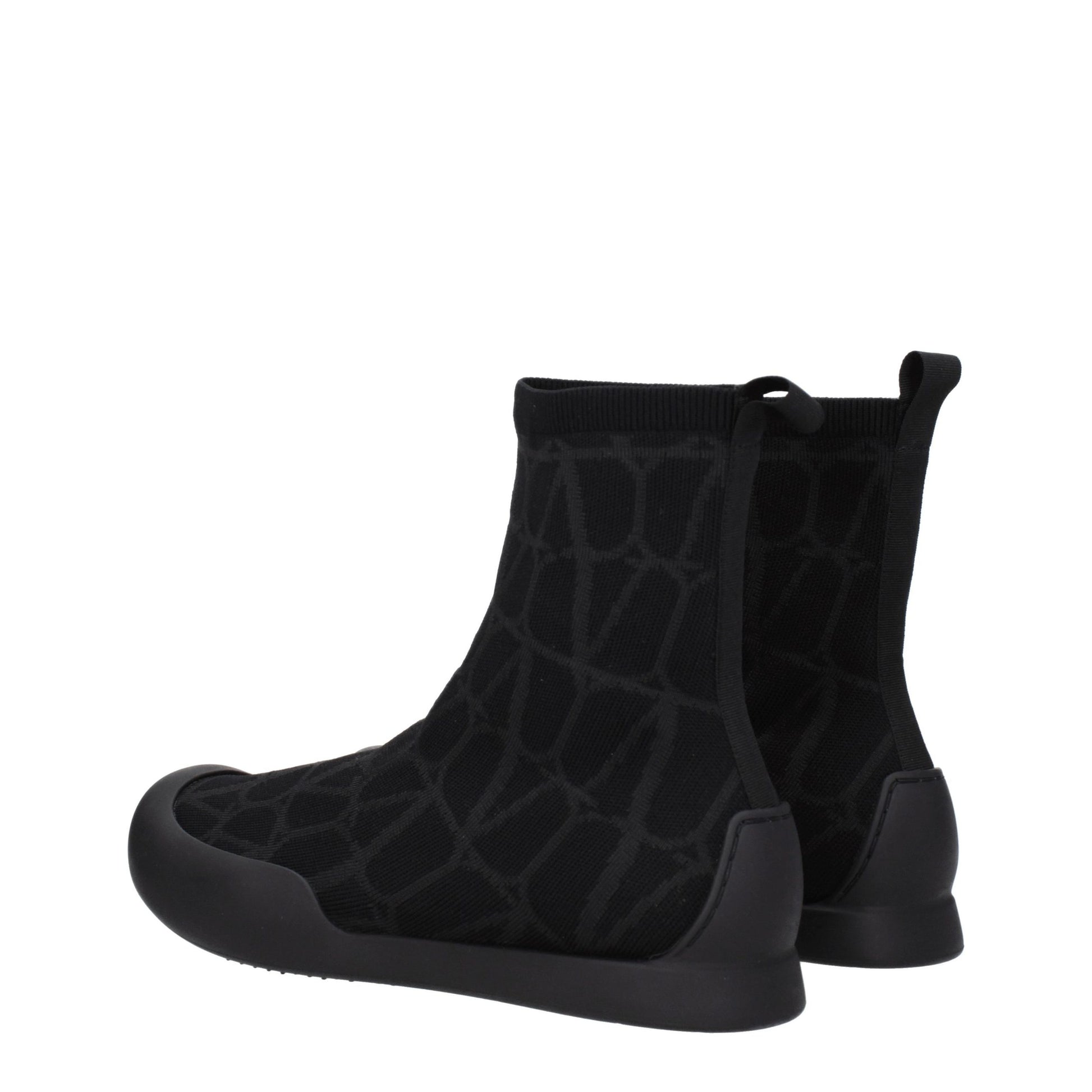 Sneakers by Valentino Garavani for men in rubber & fabric black presents a impeccable silhouette as Men's High Top Rubber & Fabric Sneakers, expertly defined by a impeccable high-top style for a impeccable, high-fashion look.