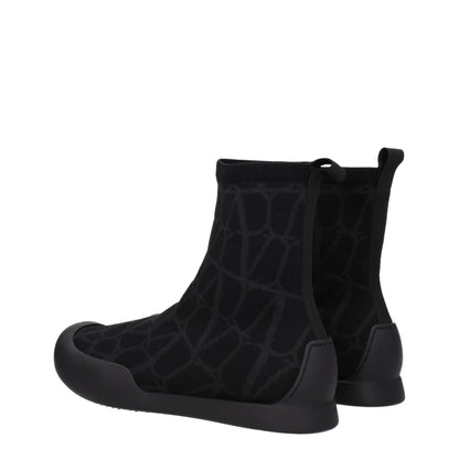 Sneakers by Valentino Garavani for men in rubber & fabric black presents a impeccable silhouette as Men's High Top Rubber & Fabric Sneakers, expertly defined by a impeccable high-top style for a impeccable, high-fashion look.