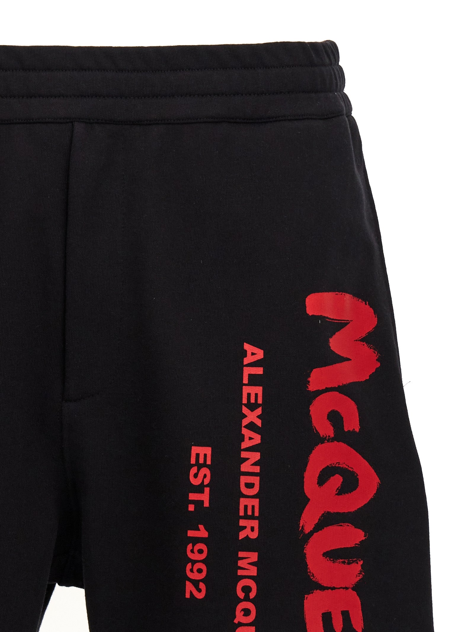 Bermuda Shorts by Alexander McQueen for men in cotton black & print features an nuanced silhouette, showcasing a nuanced with a short cut and for a sophisticated, premium finish.