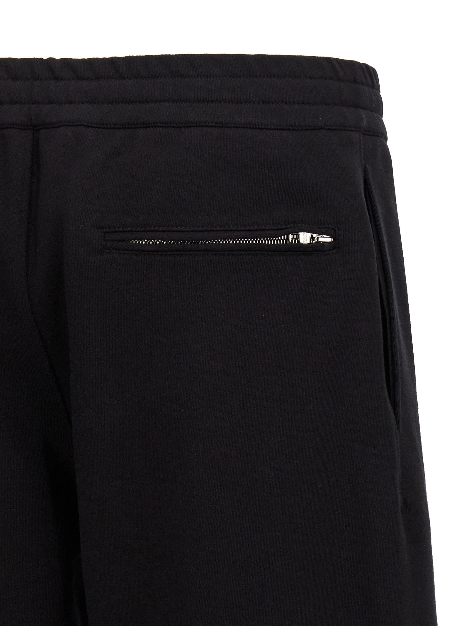 Bermuda Shorts by Alexander McQueen for men in cotton black & print presents a sleek silhouette, featuring a sleek with a refined short and a sophisticated .