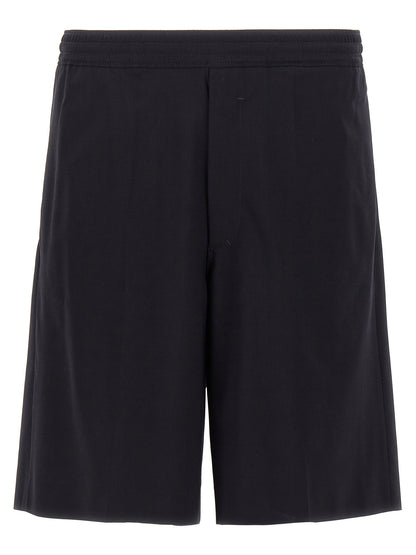 Bermuda Shorts by Givenchy for men in polyamide & wool blue features an nuanced silhouette, showcasing a nuanced with a short cut and for a sophisticated, premium finish.