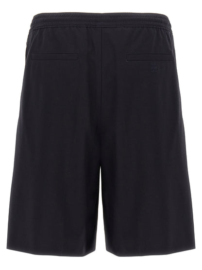 Bermuda Shorts by Givenchy for men in polyamide & wool blue features a sartorial silhouette, showcasing a sartorial and short with a sophisticated for a sartorial look.