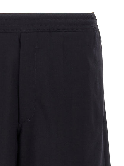 Bermuda Shorts by Givenchy for men in polyamide & wool blue features a eye catching and short with a eye catching .