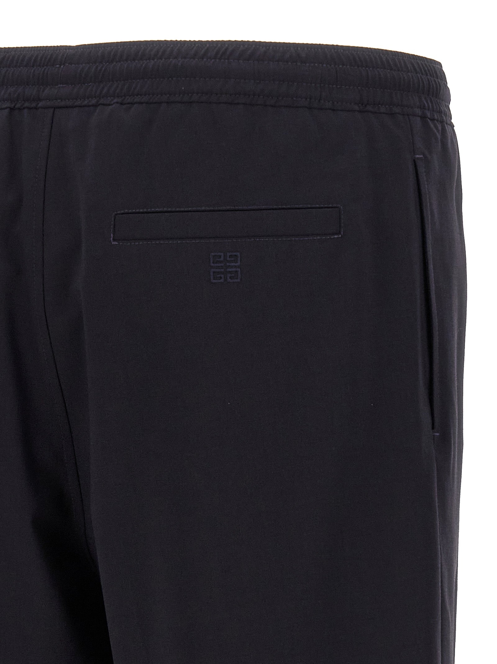 Bermuda Shorts by Givenchy for men in polyamide & wool blue features an tailored silhouette, showcasing a tailored with a short and for a sophisticated look.